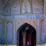 travelers in vakil mosque yard in shiraz, Iran. mosque architecture