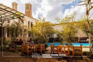 travelers in yard of ehsan house hotel kashan